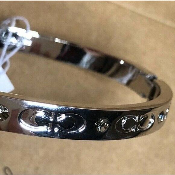 COACH SILVER TONE KISSING C HINGED BANGLE BRACELET - Picture 9 of 10